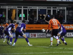 Stuart Fleetwood obscured by Robbie Willmott fires in Town`s first goal
