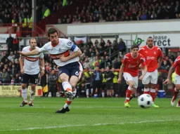 George Pilkington scores from the penalty spot