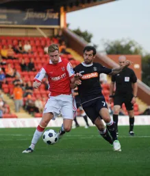 Alex Lawless tries to force his way through