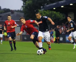 Stuart Fleetwood powers his way forward