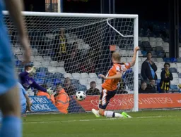 Scott Rendell slides in to score Town`s second goal