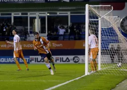 Simon Ainge wheels away after scoring Town`s first goal