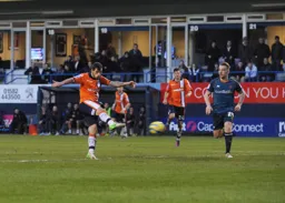 Alex Lawless smashes in the all important goal