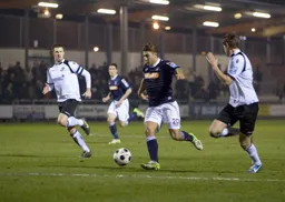 Scott Neilson breaks through into the penalty area