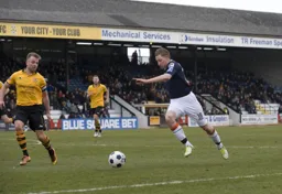 Dave Martin moves forward into the penalty area