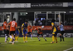 Luke Guttridge heads in the second