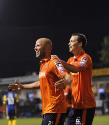 Luke Guttridge celebrates his goal