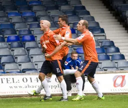 Luke Guttridge celebrates his last minute goal