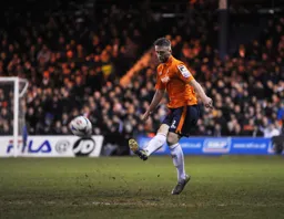 Fraser Franks plays the ball forward