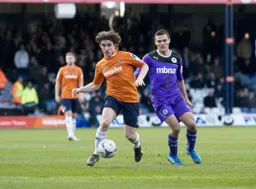 Luke Rooney looks to set up another attack