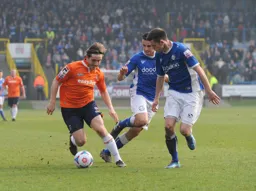 Luke Rooney takes on two Halifax players