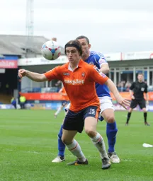 Luke Rooney about to control the ball