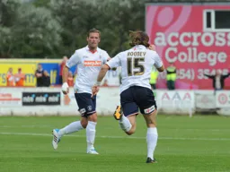 Luke Rooney celebrates with Andy Drury