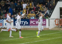 Mark Cullen celebrates his goal with Jim Stevenson and Ross Lafayette