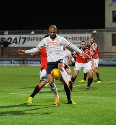 Ross Lafayette protects the ball