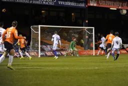 Luke Rooney leaves the keeper bemused as the ball hits the net