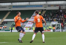 Andy Drury is congratulated by Luke Wilkinson