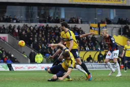 Jayden Stockley guides the ball into the net