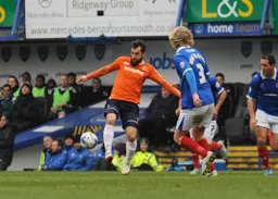 Alex Lawless lays the ball off
