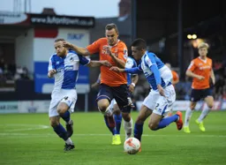 Luke Wilkinson charges through the Rovers defence