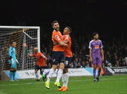 Josh McQuoid celebrates his goal with Ryan Hall