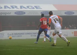 Alex Lawless fires the ball into the net for Town`s second goal