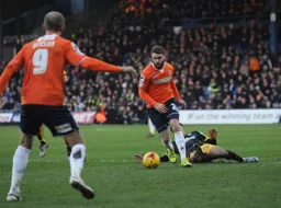 Josh McQuoid leaves a U`s defender grounded