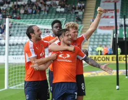 Jack Marriott shares his delight with Danny Hylton, Pelly-Ruddock Mpanzu and Cameron McGeehan