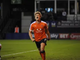 Cameron McGeehan runs away in celebration