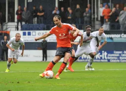 Danny Hylton completes his hat-trick and scores Town`s third goal from the penalty spot