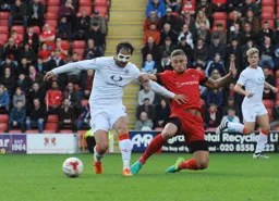 Danny Hylton comes away with the ball