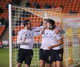 Jack Marriott, Cameron McGeehan and Danny Hylton are happy Hatters after the second goal