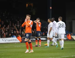 Jordan Cook and Dan Potts can't believe that Luton didn't score