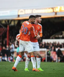 Isaac Vassell has just levelled the score and celebrates with Jordan Cook