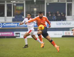 Isaac Vassell takes the ball on the run