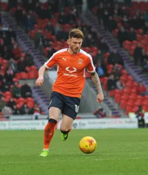 Jordan Cook looking composed on the ball