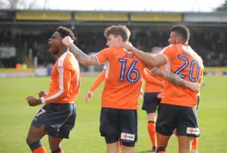 Pelly Mpanzu, Glen Rea and Issac Vassell all celebrate