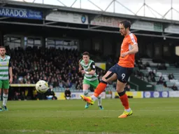 Danny Hylton scores his and Town`s first goal from the penalty spot