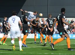Glen Rea sends a header towards goal