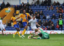 Danny Hylton sees his shot saved