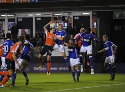 The ball is just too high for Glen Rea