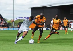 Isaac Vassell goes past Jamal Campbell-Ryce