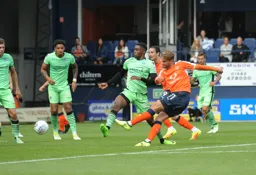 Andrew Shinnie tries a shot from the edge of the penalty area