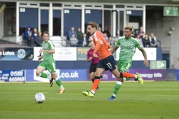 Andrew Shinnie leaves Kaiyne Woolery in his wake