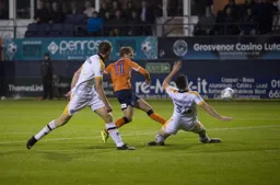 Andrew Shinnie has a go for goal