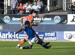 Harry Cornick takes a shot at goal