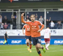 Luke Berry salutes completing his hat-trick