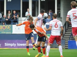 Luke Berry heads in his and Town`s first goal