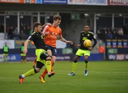 Glen Rea battles for the ball against Gary Deegan