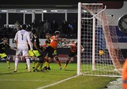Danny Hylton heads in from close range to complete his hat-trick and score Town`s seventh goal